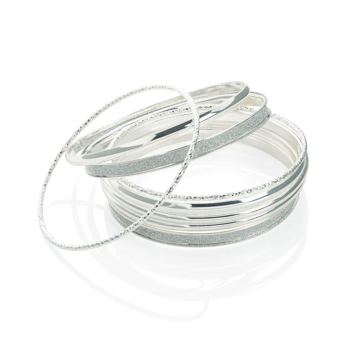 Eight piece silver colour glitter effect bangle set. by Clarissas Boutique