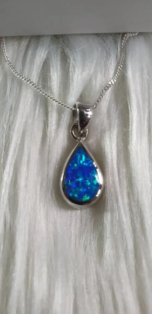 Teardrop Fire Opal Pendant by Clarissas Boutique London