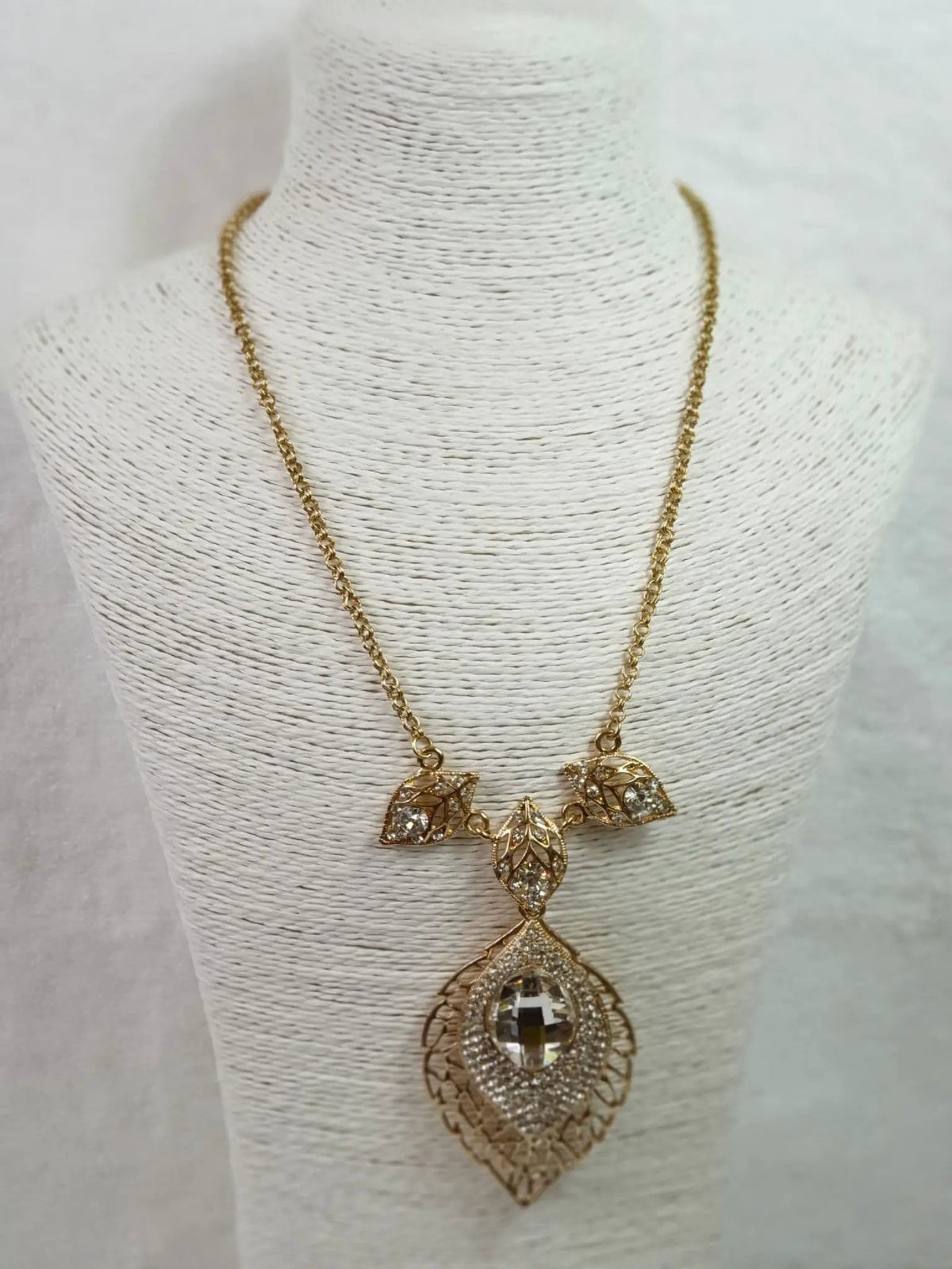Long Gold Plated Crystal Leaf Necklace by Clarissas Boutique