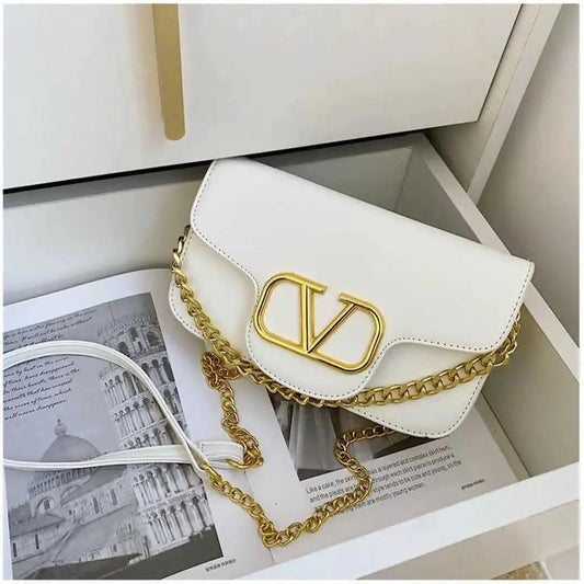 V BUCKLE CLUTCH BAG by Clarissas Boutique London